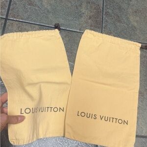 Two Louis Vuitton Yellow Dust Bags